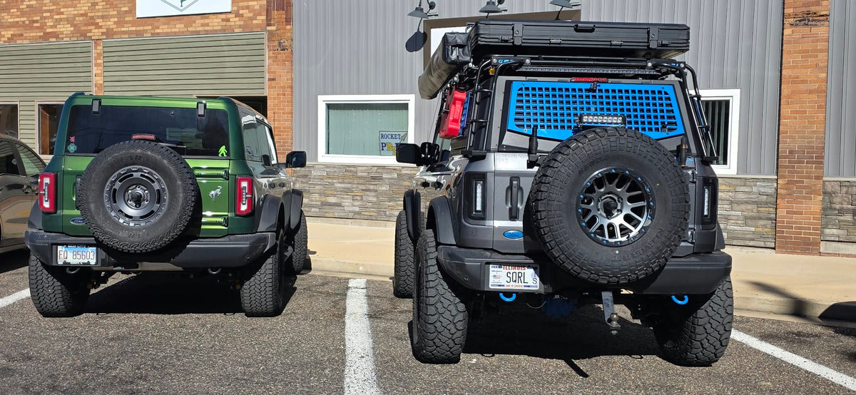 Rear view of a 2021+ Ford Bronco with the TAT2D SQRL third brake light kit above the spare tire